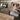 Nail gun with depth adjustment feature on a wooden surface